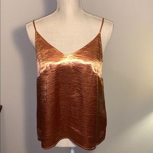 A new day metallic orange top new. Size small